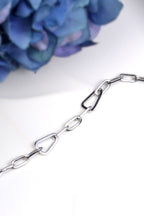 Modern Sterling silver geometric bracelet with triangle and rectangular links