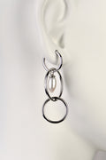 modern pearl and silver long drop earrings by jewellery designer Jorge Revilla