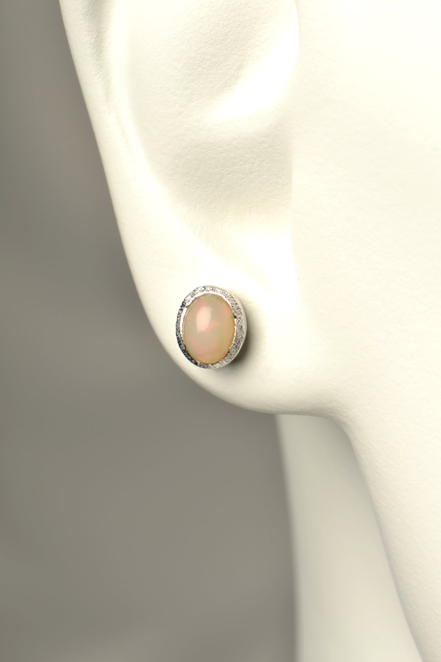oval designer opal earrings