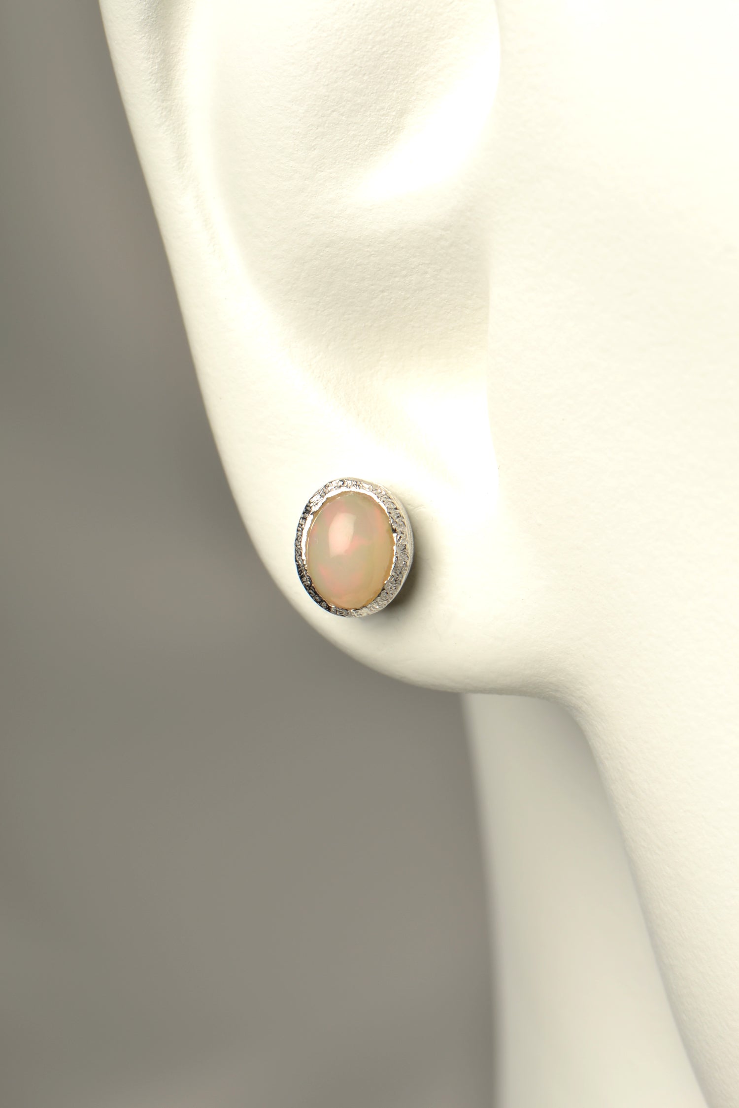 oval designer opal earrings