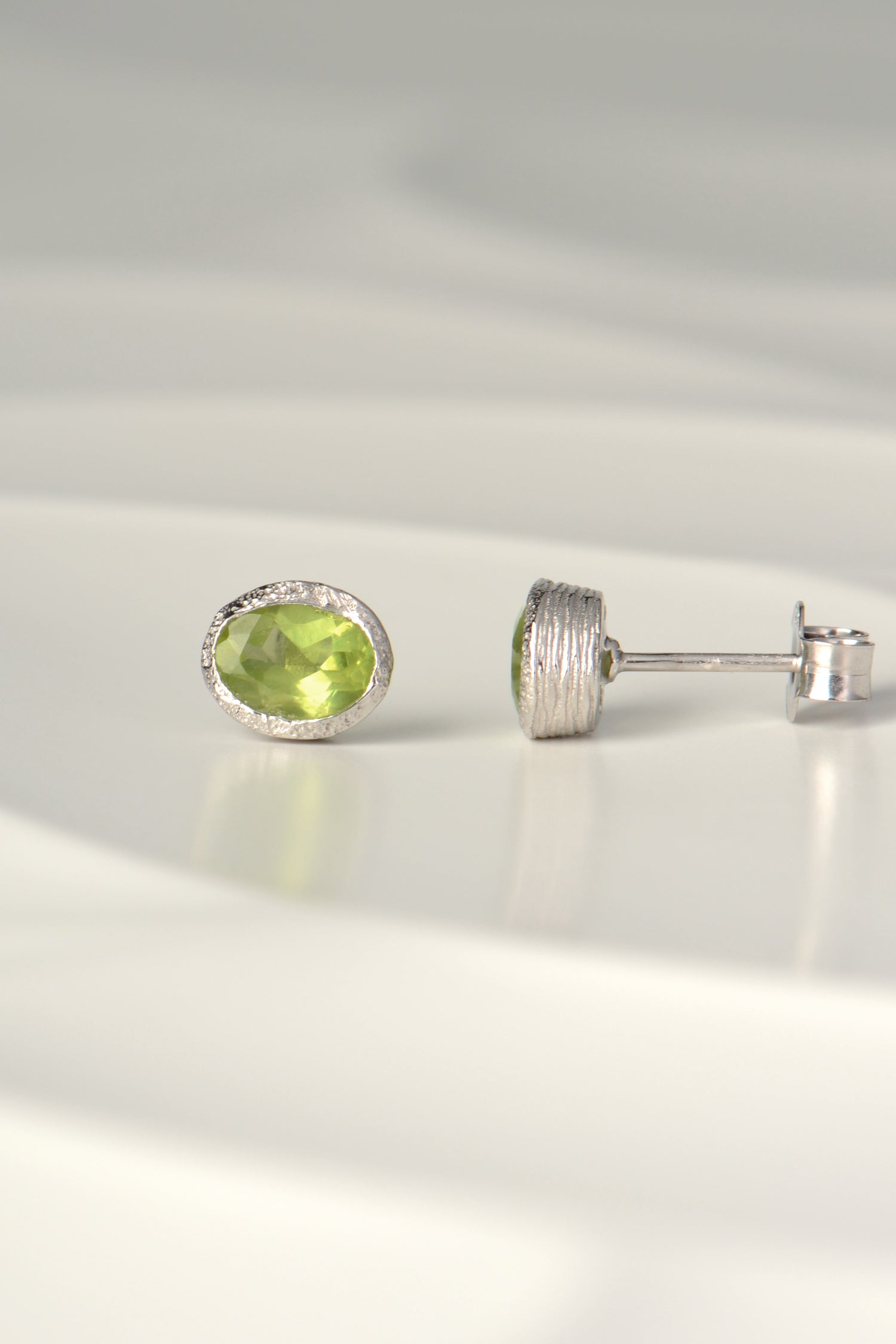 designer oval Peridot silver earrings that are real and affordable