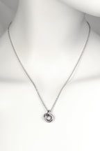 delicate modern silver necklace in the shape of a friendship knot from Christine Sadler