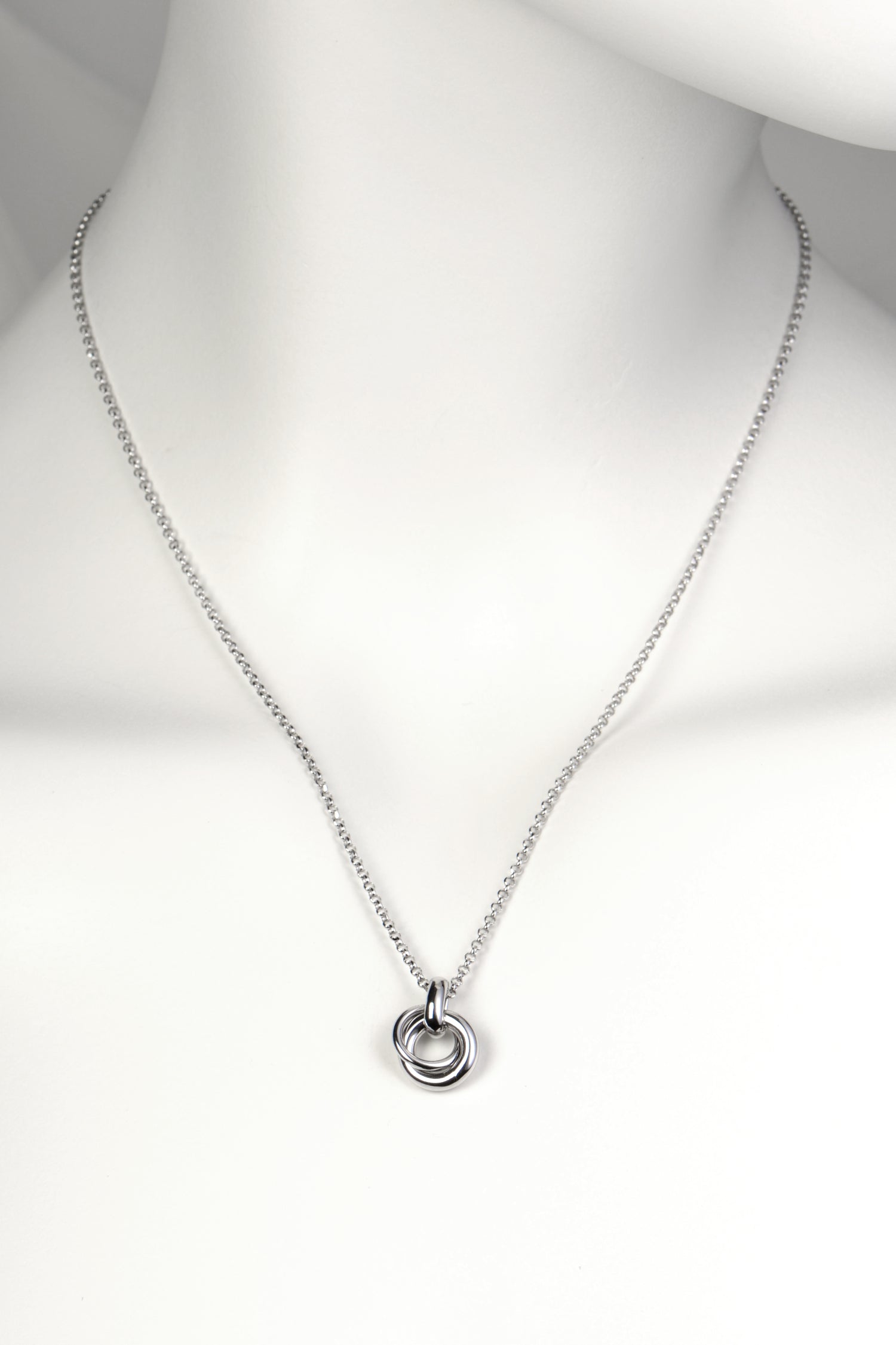 delicate modern silver necklace in the shape of a friendship knot from Christine Sadler
