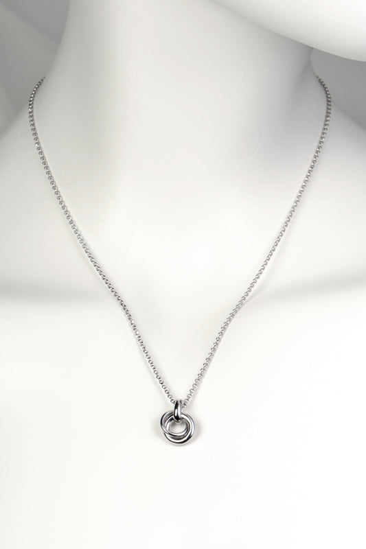 delicate modern silver necklace in the shape of a friendship knot from Christine Sadler