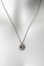 Silver "You Are Enough"  disc talisman pendant necklace worn around the neck
