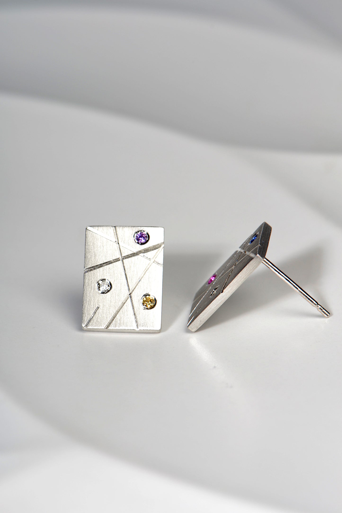 handmade designer silver rectangular earrings set with coloured sapphires and diamonds