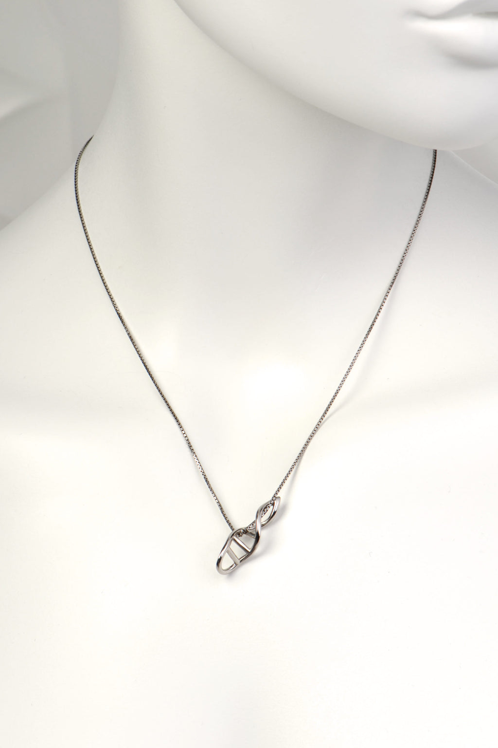 alternative styling of the silver dna pendant looped through the chain so it hangs at a 45 degree angle - Christine Sadler