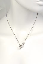 alternative styling of the silver dna pendant looped through the chain so it hangs at a 45 degree angle - Christine Sadler