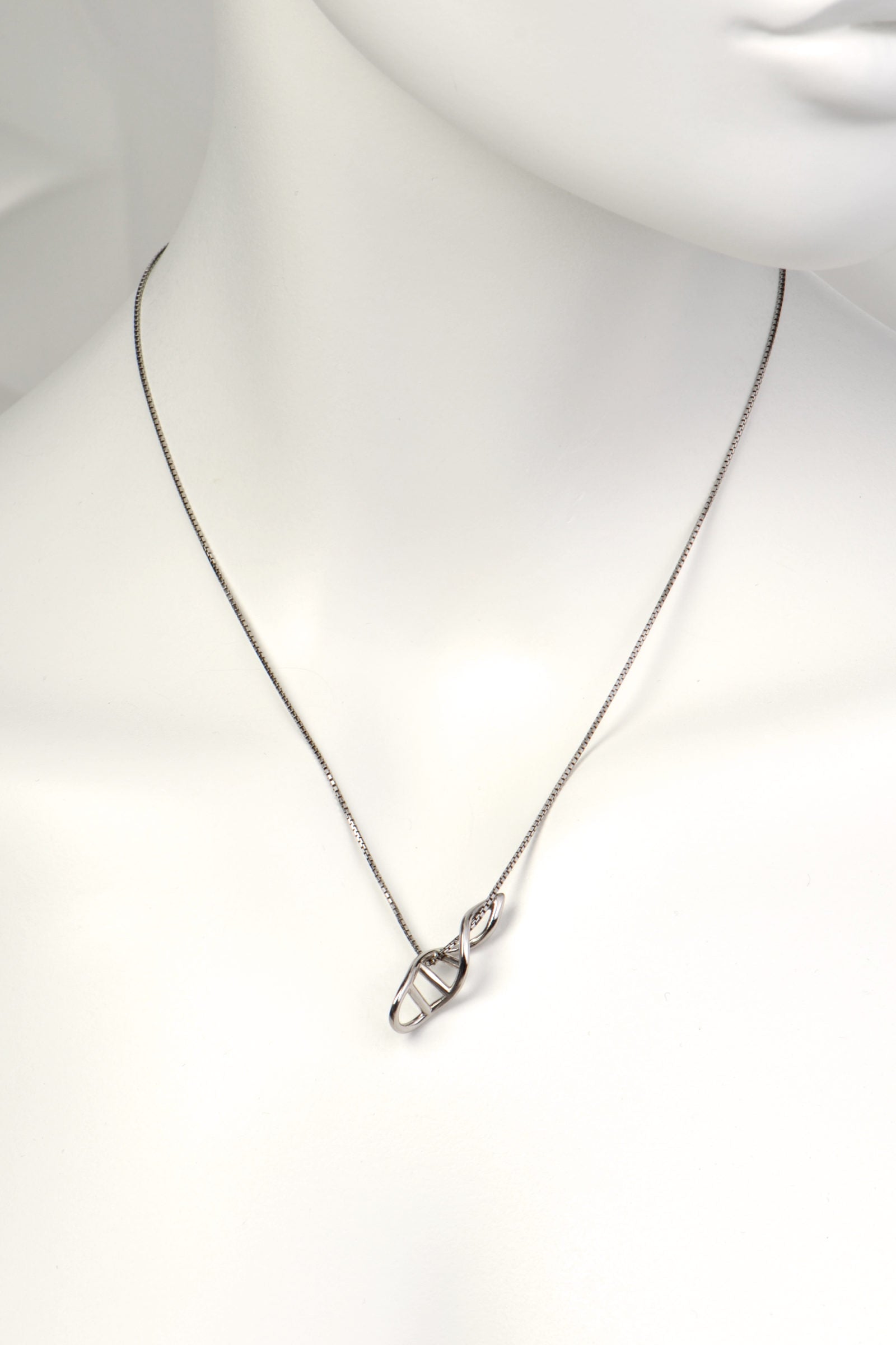 alternative styling of the silver dna pendant looped through the chain so it hangs at a 45 degree angle - Christine Sadler