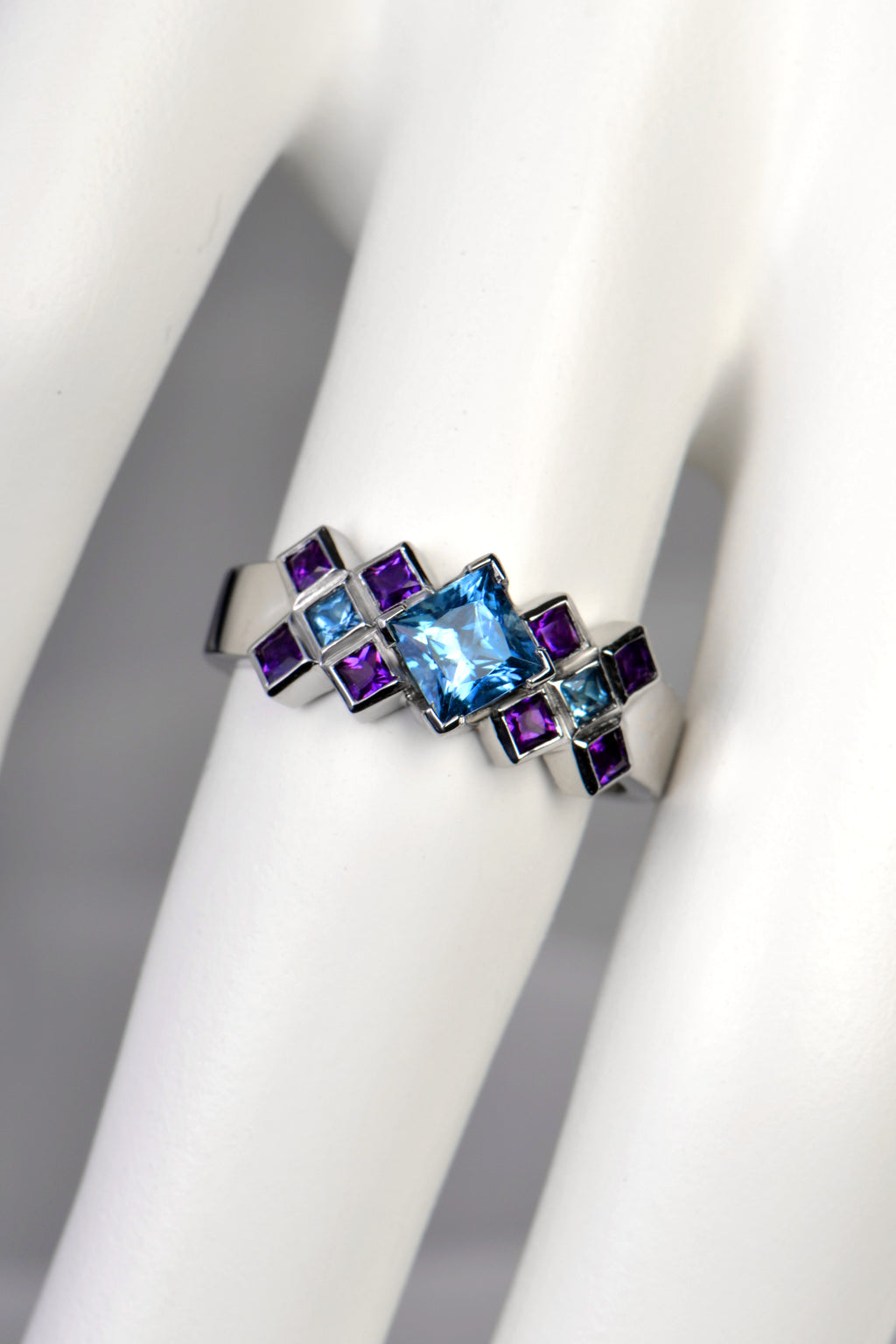 modern scottish platinum engagement ring set with aquamarines and amethysts
