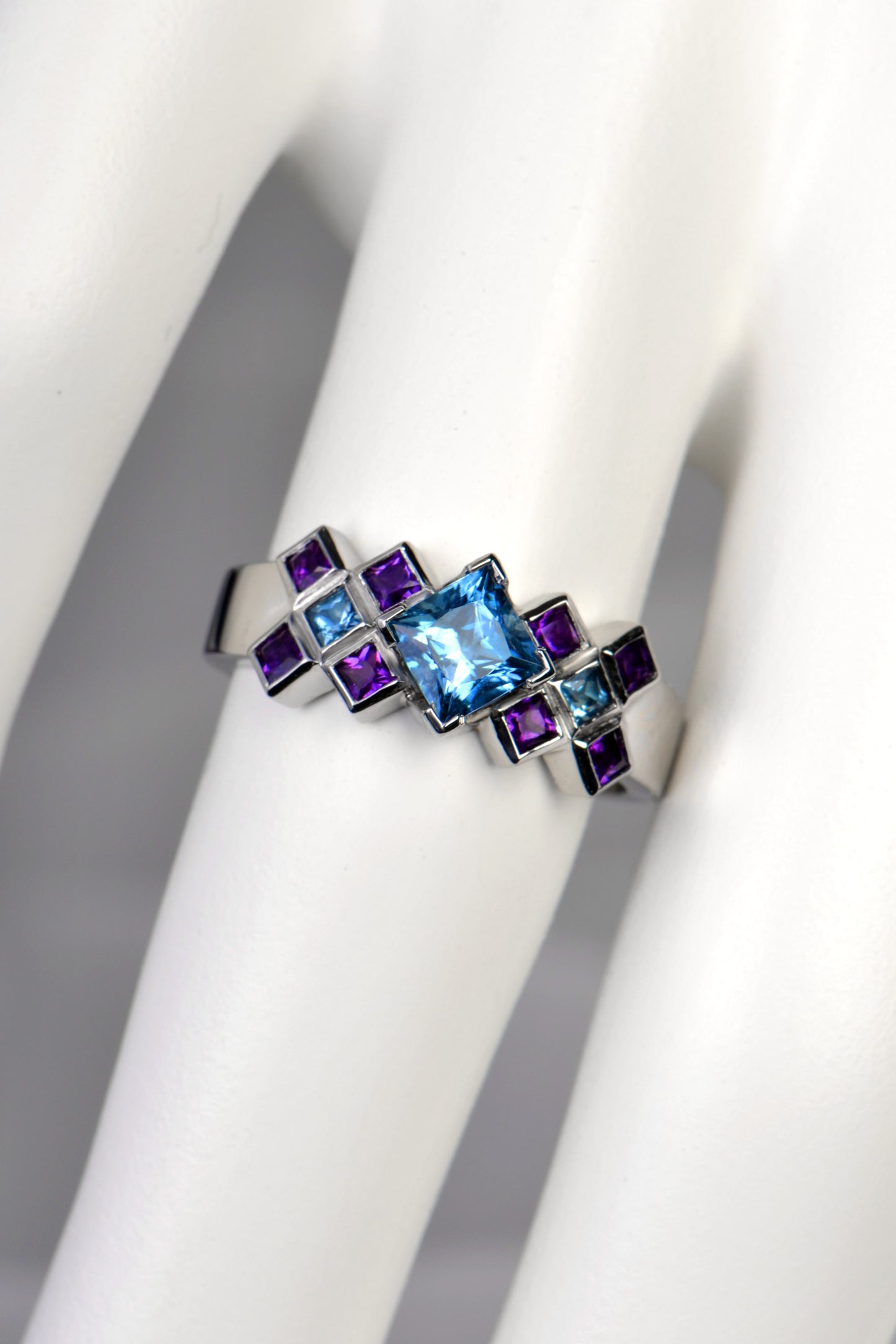 modern scottish platinum engagement ring set with aquamarines and amethysts