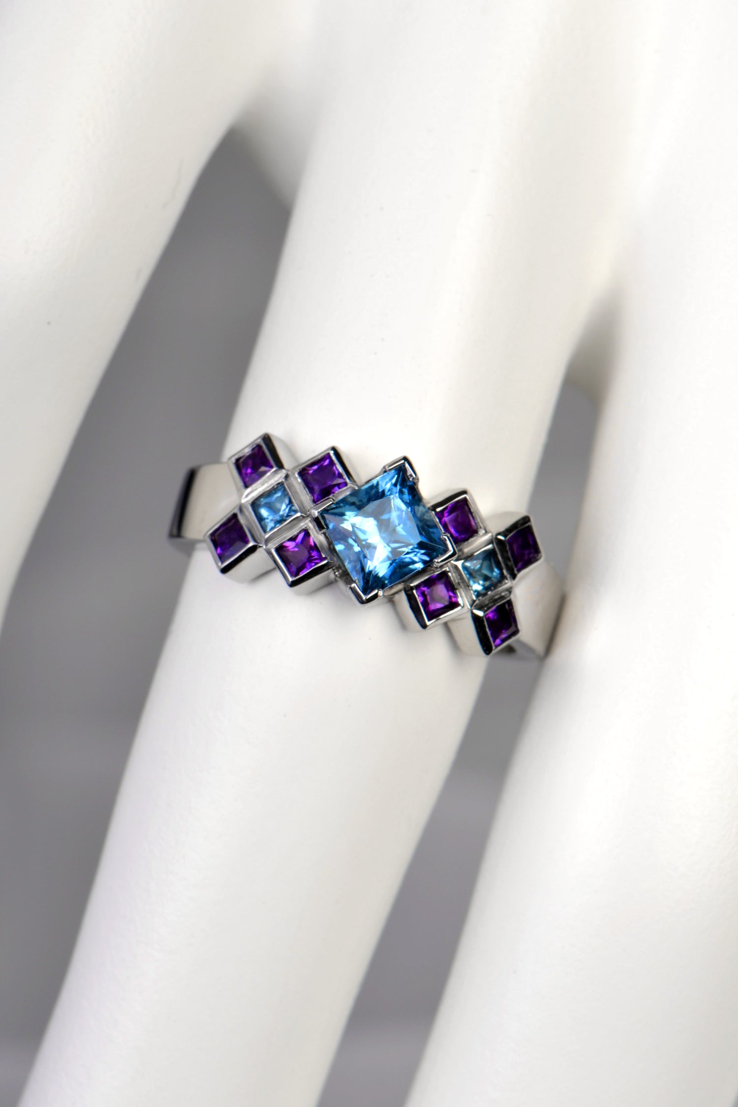 modern scottish platinum engagement ring set with aquamarines and amethysts