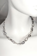 organic silver necklace design with embossed pattern that looks like frost patterns. Natural beauty jewellery collection from Christine Sadler