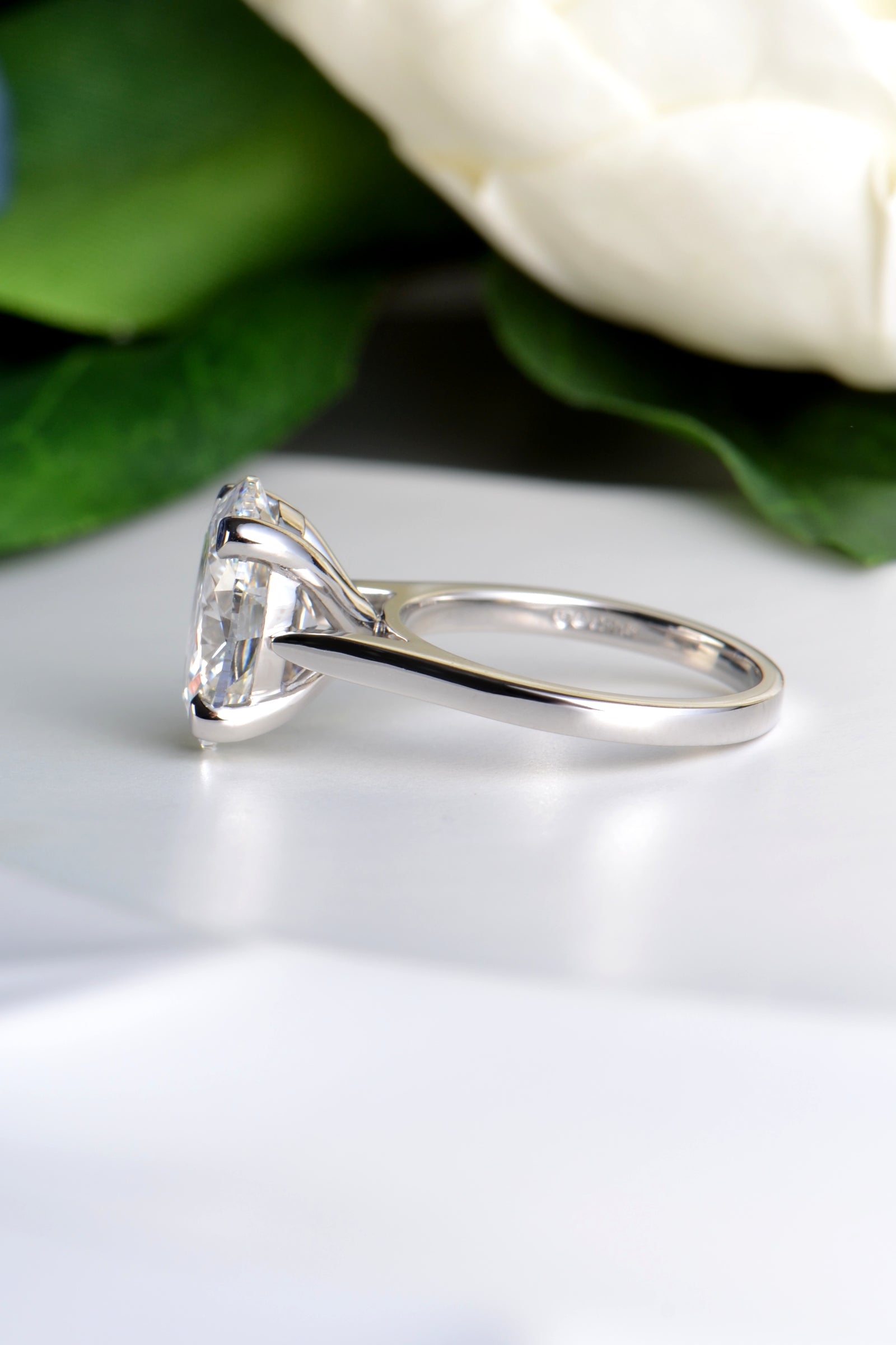 Four claw setting on three carat oval lab diamond ring in platinum - Christine Sadler