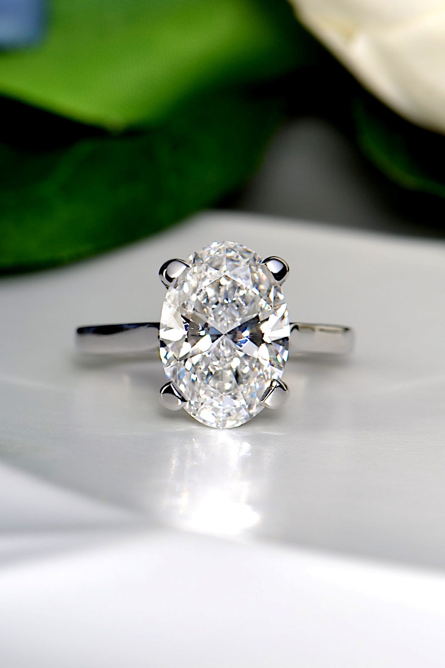 Three carat oval lab grown diamond engagement ring in platinum with four claw setting - Christine Sadler