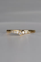 shaped wedding ring for a woman in 18ct gold with 9 diamonds that create the look of a tiara.