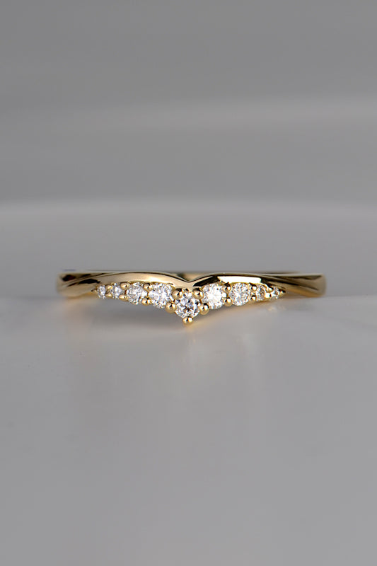 shaped wedding ring for a woman in 18ct gold with 9 diamonds that create the look of a tiara.