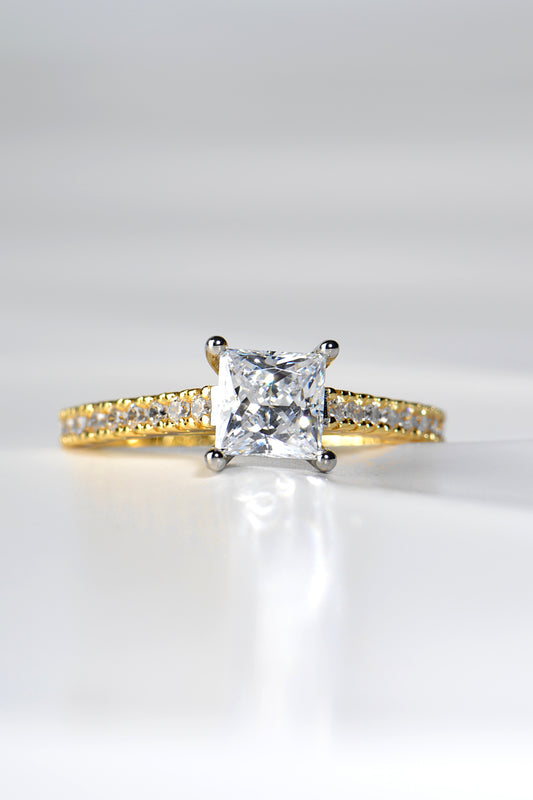 yellow gold princess cut diamond engagement ring with a platinum four claw setting, made in the UK