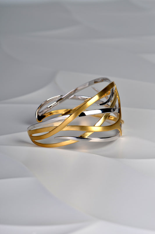 silver and 18ct gold plated overlapping thorn or roots design