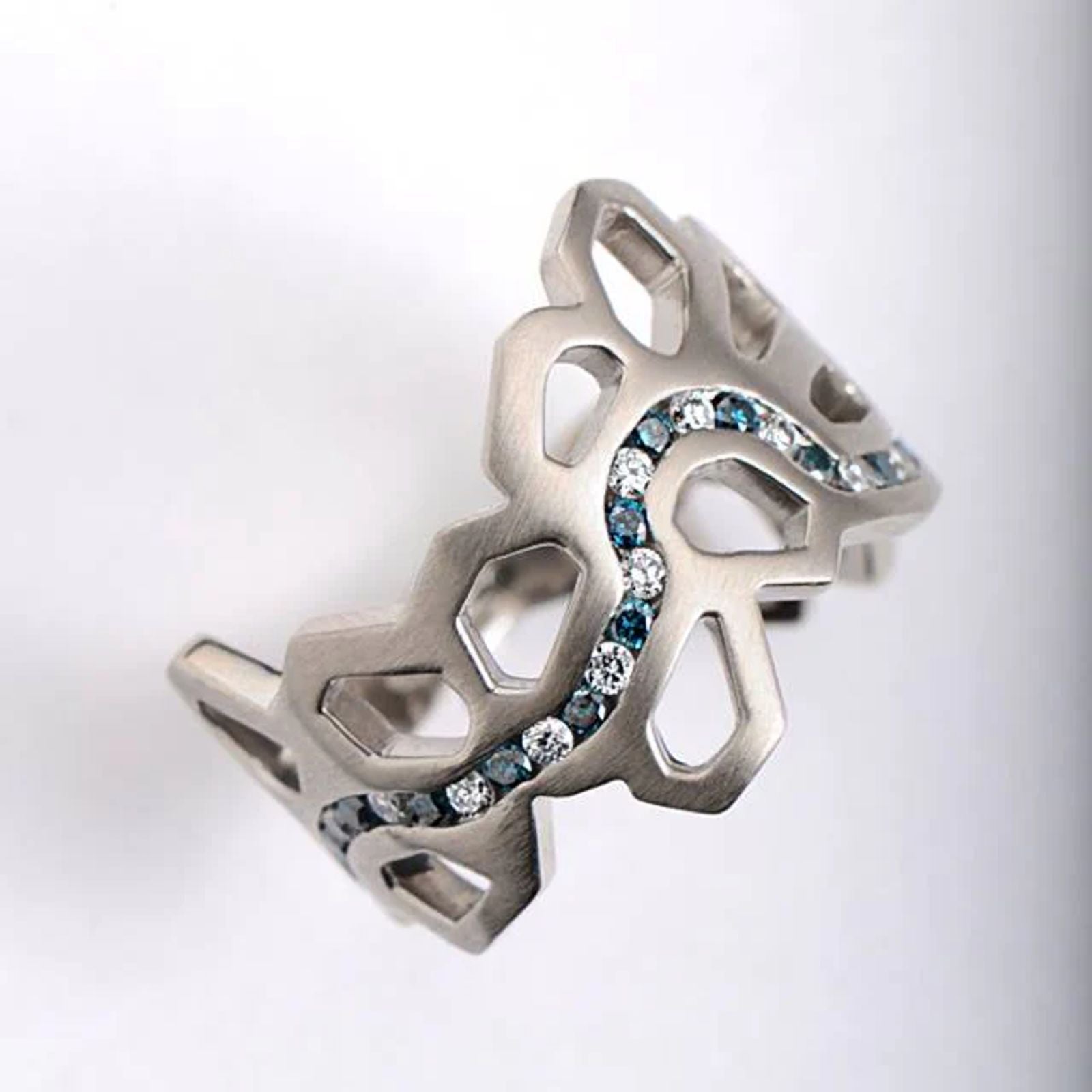Unique pomegranate inspired wedding ring designed by Christine Sadler
