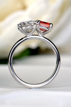 Straight-on view looking directly through the inner band opening of a platinum Moi et Toi ring showing the clean interior craftsmanship, by Christine Sadler