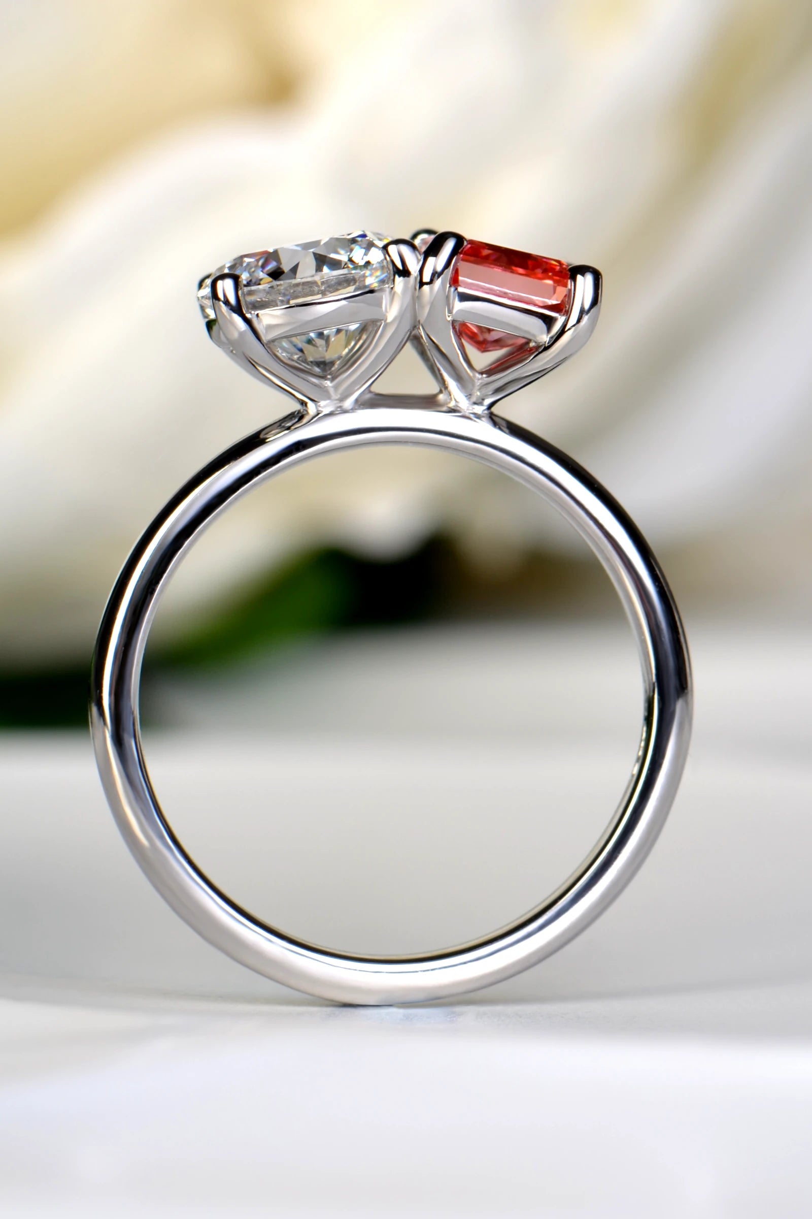 Straight-on view looking directly through the inner band opening of a platinum Moi et Toi ring showing the clean interior craftsmanship, by Christine Sadler