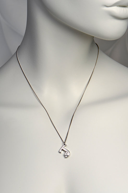 designer white gold initial necklace set with a diamond by Christine Sadler
