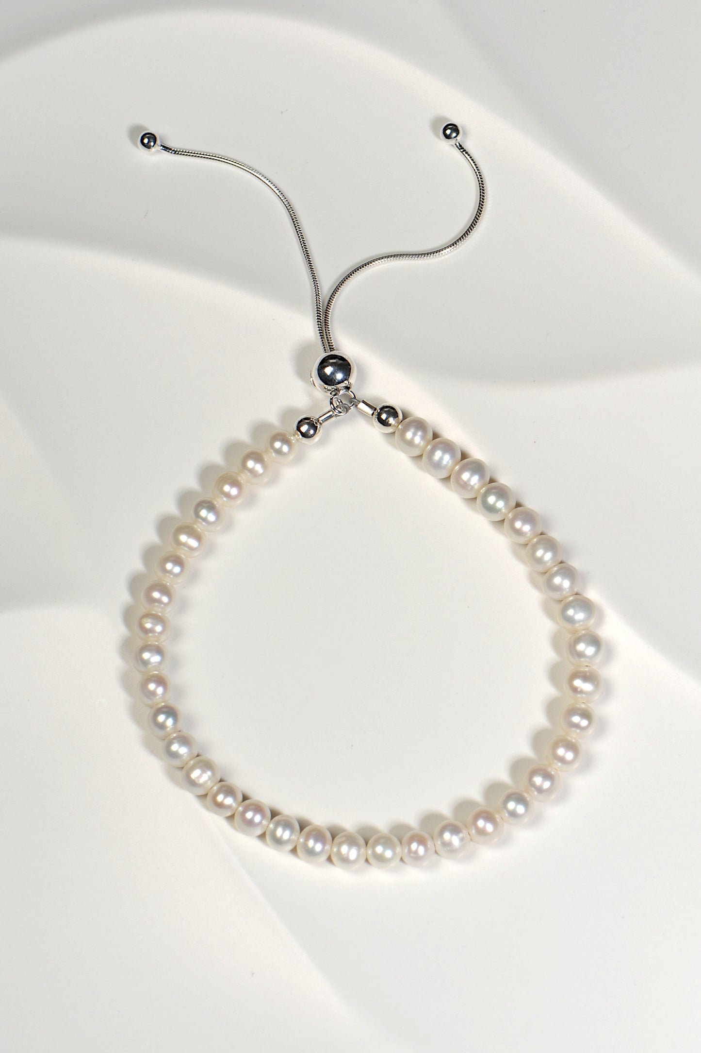 real pearl bracelet with an adjustable silver slider clasp