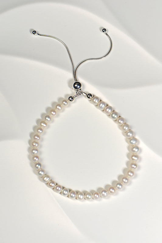real pearl bracelet with an adjustable silver slider clasp