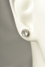 affordable designer silver stud earrings set with white topaz which is an alternative gemstone for an April birthstone