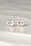 designer silver April birthstone earrings