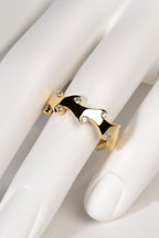 unusual 18ct yellow gold diamond ring with an unusual flame design inspired by fire. Perfect as a diamond wedding ring, diamond eternity ring or even just a special gift