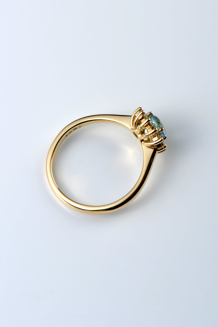 Aquamarine and diamond flower ring 18ct yellow gold