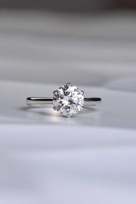 2 carat round brilliant cut diamond set in platinum six claw engagement ring from jewellery designer Christine Sadler who is based in Ayr Scotland