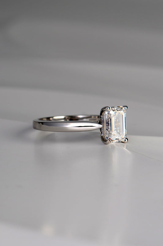 modern designer emerald cut diamond platinum ring by Christine Sadler