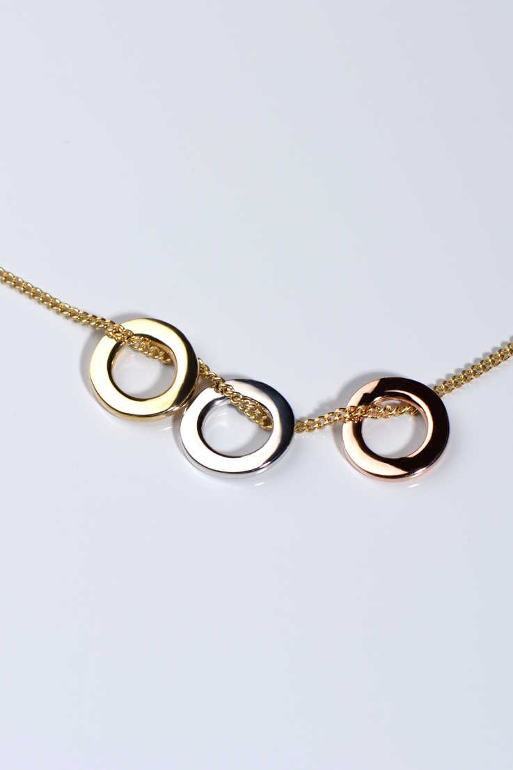circle pendants on gold necklace with three colours of gold - Christine Sadler Unforgettable Jewellery