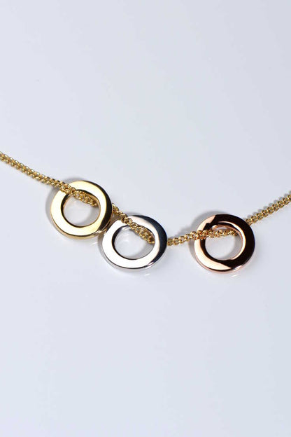 circle pendants on gold necklace with three colours of gold - Christine Sadler Unforgettable Jewellery