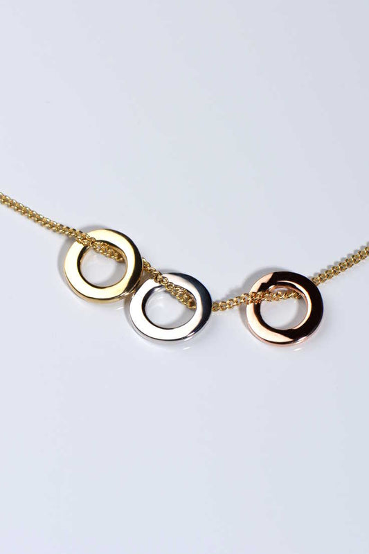 circle pendants on gold necklace with three colours of gold - Christine Sadler Unforgettable Jewellery