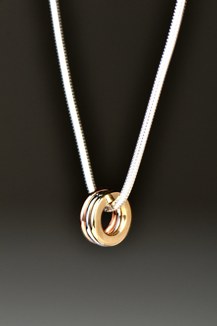 Affinity three coloured gold rings pendant