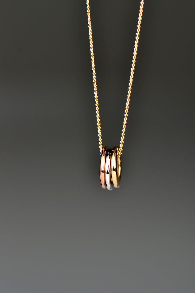 Affinity necklace with three colours of gold rings