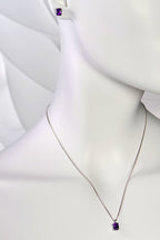 Radiant cut amethyst white gold earrings shown with the matching necklace - Christine Sadler