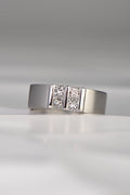 contemporary platinum and diamond princess cut ring inspired by battenberg cake. Four princess cut diamonds are set in a square pattern with polished bars on a wide platinum band. A Highly unusual design available exclusively from Christine Sadler