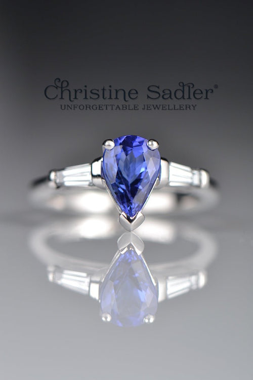 Front view of handcrafted Pear Shaped Tanzanite & Diamond Engagement Ring in 18ct white gold 