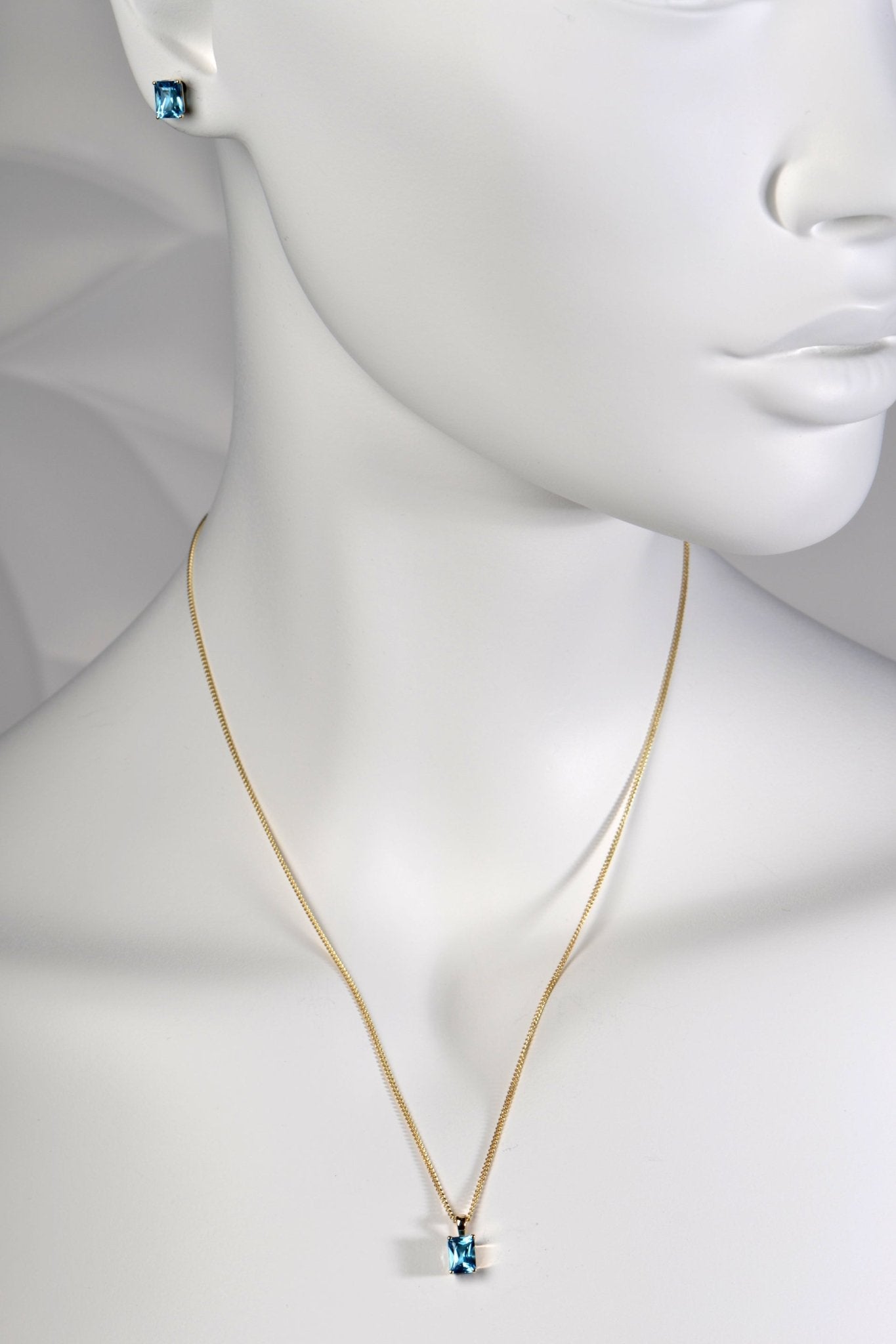 Radiant cut blue topaz gold earrings with matching necklace - Christine Sadler