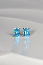 high quality swiss blue topaz stud earrings in yellow gold Christine Sadler jewellery Ayr