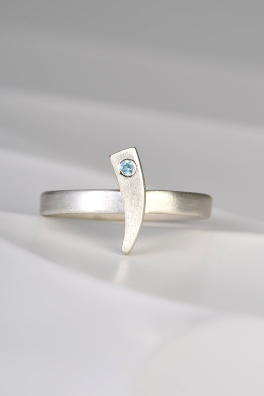 Cairn curve blue topaz ring
