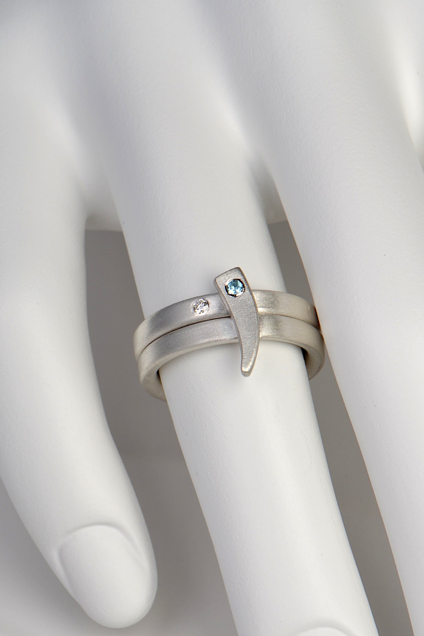 Cairn stacking rings with diamond and blue topaz