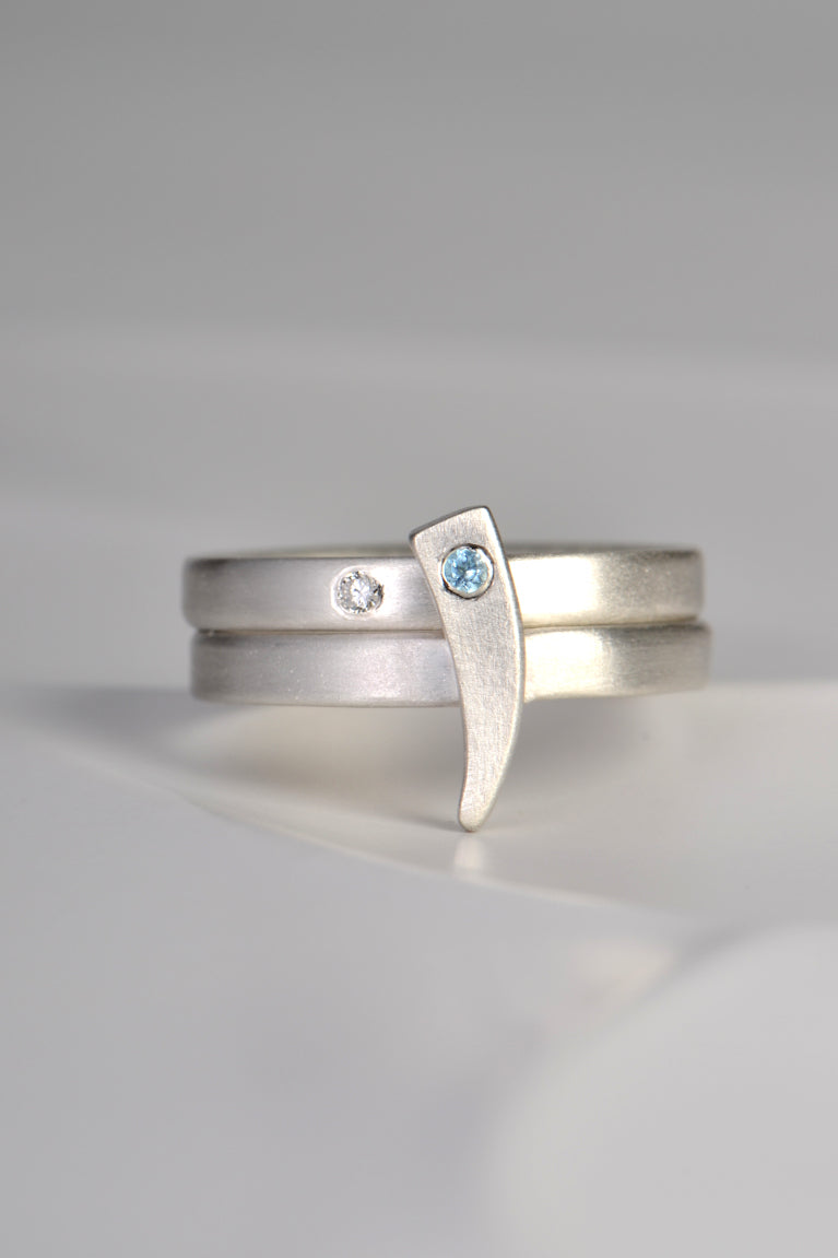 Cairn stacking rings with diamond and blue topaz