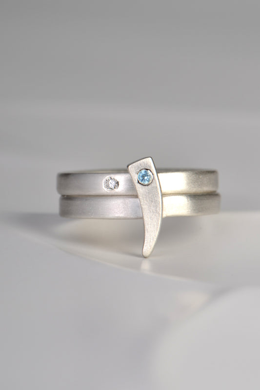 Cairn stacking rings with diamond and blue topaz