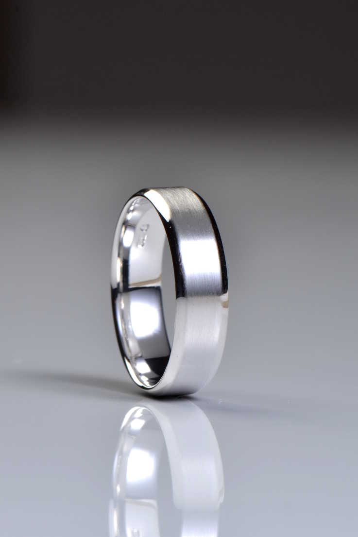 modern stylish gents wedding ring that  has a contemporary brushed and polish finish